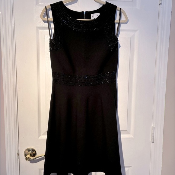 Black Knitted Dress with embroidered beads. - Picture 2 of 9